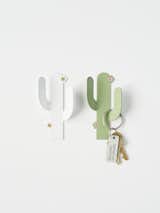 Cactus Hook

A desert inspired, cactus shaped hook with colored
screws for flowers. 5" high x 2.75" wide. Made in LA.