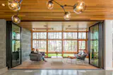 This gorgeous custom-built lake house in Minnesota seals off or integrates its three-season porch in relation to the rest of the house using its SL60 system.