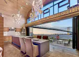 Find design inspiration in this Philadelphia kitchen overlooking the Benjamin Franklin Bridge. An operable 30-foot opening featuring a NanaWall system provides an indoor/outdoor experience and ensures weather protection from the unpredictable climate outside.