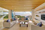For this Tiburon, CA residence, every room features a view to the San Francisco Bay with the help of several NanaWall sliding glass systems. The California sunsets perfectly blend in with natural light wood tones inside the home.