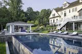 Outdoor, Back Yard, Trees, Grass, Woodland, Large Pools, Tubs, Shower, and Infinity Pools, Tubs, Shower  Photo 1 of 8 in Knoll Pool House by NanaWall