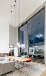 Dining Room, Chair, Two-Sided Fireplace, Bench, and Table  Photo 9 of 18 in Leipzig Estate by NanaWall