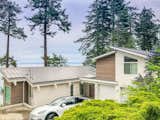 Exterior, Beach House Building Type, House Building Type, and Metal Roof Material  Photo 6 of 6 in Cordova Bay Residence by NanaWall