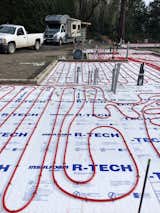 Radiant heat and concrete floors keep the house cool in summer and warm in winter.