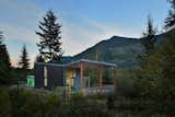 Exterior, Shed RoofLine, Glass Siding Material, House Building Type, Cabin Building Type, Green Siding Material, Metal Roof Material, Butterfly RoofLine, and Wood Siding Material  Photo 4 of 19 in Bear Run Cabin by David Coleman / Architecture