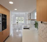 Kitchen, Wood Cabinet, Ceramic Tile Backsplashe, and Ceiling Lighting  Photo 19 of 36 in The Fountain Villa by BoysPlayNice Photography & Concept