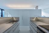 Kitchen, Refrigerator, Drop In Sink, White Cabinet, Cooktops, and Track Lighting  Photo 16 of 34 in Family House in the River Valley by BoysPlayNice Photography & Concept
