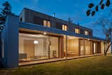 Exterior, Wood Siding Material, House Building Type, Metal Siding Material, Glass Siding Material, Stucco Siding Material, Flat RoofLine, Concrete Siding Material, Green Roof Material, and Metal Roof Material  Photo 9 of 30 in New House in the Old Garden by BoysPlayNice Photography & Concept