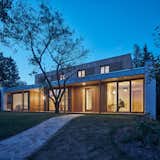 Exterior, Stucco Siding Material, Metal Roof Material, Glass Siding Material, Concrete Siding Material, Green Roof Material, Wood Siding Material, Flat RoofLine, House Building Type, and Metal Siding Material  Photo 8 of 30 in New House in the Old Garden by BoysPlayNice Photography & Concept