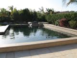 Stepstone Classic Pool Coping completes, connects, and accentuates both the spa and the pool. #stepstone #concrete #pavers 