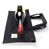 Horizontal wine tote carries one bottle with three side pockets for small food items and accessories. Makes the perfect gift or casual picnic.

shop aplat 
dwellstore.com  Shujan Bertrand’s Saves from Aplat Vin Totes
