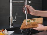 MagnaTite docking keeps the kitchen pull-down spray wand firmly in place with a powerful integrated magnet, so it stays docked when not in use.