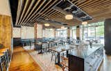 All Purpose is located in the neighborhood of Shaw in Washington DC. Using air dried Pine selectively cut from Massachusetts, Poritz and Studio fabricated the tables, banquets, booths, millwork and back bar for the restaurant. Custom stains were used on the table tops to match the interior paint finishes.   
