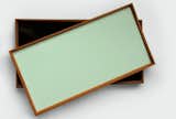 Turning Tray - MADE TO FIT YOUR LIFE

The Turning Tray was designed in 1956 by Finn Juhl, bearing his trademark curved teak frame and precise corner joints. Made without handle bars, the tray’s curvature allows space for all sizes of hands, from child to adult, to pick it up. Designed as dual-sided, the Turning Tray boasts two glossy laminate sides held together by carefully crafted corner joints.

------

Material: Teak wood and laminate - Dimensions: Small 23 x 45 cm, Medium 30 x 48 cm, Large 38 x 51 cm

