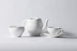 FJ Essence - THE ESSENCE OF FINN JUHL

FJ Essence illuminates the unique aesthetics of Finn Juhl. The crisp white and hand glazed surface curvatures into those well-known organic shapes that have made Finn Juhl famous on an international level. The lean design combined with the clear white porcelain will be suitable on any occasion. Originally Finn Juhl designed FJ Essence in 1952 but it never went into production. Now, more than 60 years after, ARCHITECTMADE can finally invite you to enjoy a cup of tea with Finn Juhl.

------

Material: Hand glazed porcelain in white - Dimensions: Tea cup 12 cm x 9.5 cm x 6 cm, Saucer 15 cm x 15 cm x 2.5 cm, Teapot: 21.5 cm x 13 cm x 12 cm, Sugar bowl 11 cm x 10.5 cm x 7.1 cm