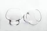Spring - THE SPACE WITHIN

Designed by one of Denmark’s most renowned architects, Jørn Utzon, these mouth blown glasses are inspired by pure materials and fluid space. Utzon once said, “The greatest importance of the glass is the space within it.”Be it cognac, cocktails or water, Spring is more than a glass, it is a sculptural vessel for your beverage.

------

Material: Handmade drinking glass - Dimensions: H 8 cm D 9 cm 

