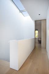 Hallway and Light Hardwood Floor  Photo 15 of 16 in Verandah Place Townhouse by Space4Architecture