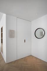 Hallway and Light Hardwood Floor entry vestibule  Photo 3 of 27 in The Oak Thread by Space4Architecture