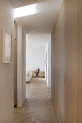 Hallway and Light Hardwood Floor Hallway towards Living room  Photo 4 of 27 in The Oak Thread by Space4Architecture