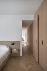 Bedroom, Night Stands, Light Hardwood Floor, and Bed Primary Bedroom  Photo 14 of 27 in The Oak Thread by Space4Architecture