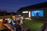 The rooftop provides a playful and secluded space to watch movies, relax or practice putting.