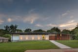 Exterior, Stucco Siding Material, Wood Siding Material, House Building Type, Shingles Roof Material, Hipped RoofLine, Brick Siding Material, and Glass Siding Material Street View  Photo 1 of 18 in Homestead Residence by KEM STUDIO