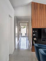 Hallway and Concrete Floor Hallway from Open Kitchen + Dining + Living to Master Living  Photo 10 of 18 in Homestead Residence by KEM STUDIO