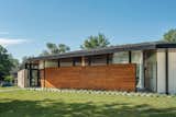 Exterior, Hipped RoofLine, Stucco Siding Material, Shingles Roof Material, Glass Siding Material, House Building Type, Brick Siding Material, and Wood Siding Material Breezeway  Photo 4 of 18 in Homestead Residence by KEM STUDIO