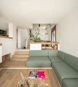Living Room, Sofa, Coffee Tables, Pendant Lighting, and Light Hardwood Floor  Photo 12 of 21 in AUGUST  |  Triplex in the Collserola hills of Barcelona