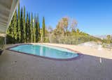 3908 Scadlock Lane, Sherman Oaks, CA	– $1,485,000 offered by ELIAS TEBACHE
C. 310 / 770 / 2976

View the entire listing here: https://goo.gl/3M5FA4

The Martson Residence, Designed by Edward Fickett, FAIA. Beautifully updated while respecting the original Mid-Century Modern Architecture. Entering the home you are welcomed with tons of natural light from the walls of glass and skylights above. Gorgeous built-in cabinetry with wood paneling accents beautifully with the brick fireplace which is a great focal point of the home. Re-done Kitchen and Bathrooms for today's modern living while the 3 bedrooms are soaked in natural light giving you a sense of what indoor-outdoor living is all about. The spacious floorplan with High ceilings allows for great entertaining and comfortable living. Rarely do you see a view home with so much outdoor space that include a pool and separate yard to enjoy our great Cali weather. Completely private to help you enjoy your outdoor space and your fabulous views of the Valley. Paid off Solar panels allow for "off-the-grid" living. Architectural homes like this are hard to come by.
