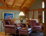 A Cozy Sitting Area in the Loft  Photo 14 of 17 in Yellow Brook Farm House by Timberpeg