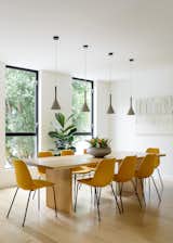 Dining Room, Chair, Table, and Pendant Lighting  Photo 1 of 3 in Photos...Ideas by Bradford Young  from Fitty Wun