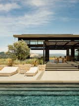 Outdoor, Large Patio, Porch, Deck, Large Pools, Tubs, Shower, Stone Patio, Porch, Deck, Back Yard, Concrete Patio, Porch, Deck, and Shrubs Sonoma Wine Country I  Photo 6 of 10 in Four Enormous Glass Doors Turn This Northern California Home Into an Outdoor Pavilion from Welcome To PARADISE