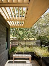 Outdoor, Horizontal Fences, Wall, Metal Fences, Wall, Trees, Decking Patio, Porch, Deck, Raised Planters, Wood Fences, Wall, Back Yard, and Wood Patio, Porch, Deck  Photo 3 of 7 in Portola Valley Ranch by Feldman Architecture