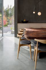 Dining Room, Table, Chair, and Concrete Floor  Photo 7 of 11 in Sunrise by Feldman Architecture