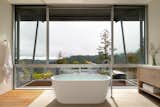 Bath Room and Freestanding Tub  Photo 7 of 11 in A Minimalist House Stands Out in a Wild Landscape from Sunrise