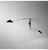 Serge Mouille, Pivoting two-armed wall light with Lampadaire and Casquette shades, designed 1953.  Photo Phillips.
