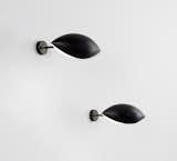 
SERGE MOUILLE
Pair of "Œil" wall lights, circa 1956.  Photo Phillips.