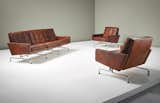 Poul Kjærholm,
three-seater sofa and pair of armchairs, model nos. PK 31/3, PK 31, designed 1958.  Photo: Phillips.