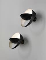 SERGE MOUILLE, Pair of ‘Saturne’ wall lights, 1965.  Photo: Phillips.  Photo 11 of 22 in Illuminate by Erin Jean from pendants & sconces