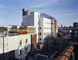 From an adjacent rooftop the penthouse forms part of the urban fabric of the East Village.  Teak, galvanized steel, Cor-Ten steel and Portland cement stucco were chosen to both blend in and to weather well over the years.  Photo 9 of 9 in East Village Penthouse & Roof Garden by pulltab