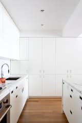 Kitchen, Ceiling, Marble, Undermount, Dishwasher, Wall Oven, Ceramic Tile, Light Hardwood, and White  Kitchen Wall Oven Light Hardwood Undermount White Photos from Highline Residence