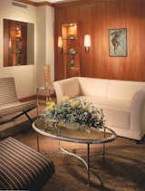 Pear wood paneling provides the backdrop for the sitting area of the living room.