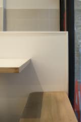 Seating immediately inside and outside the shopfront window diminishes the threshold between inside and outside.
