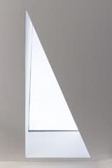 Recalling the Skyspaces of the artist James Turrell, but in a triangular geometry, the roof-lights refocus attention on framed views of the sky.