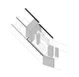 Viewed from the living area of the open-plan space, the dining area is visually defined by a crank in the floor-plan and a triangular roof-light, which punctuates this reorientation on the ceiling plane.