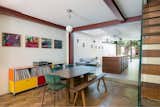 The new structure is concealed in the extension, and expressed in the existing house, the finished paint colour recalling the oxide primer at the time of installation.