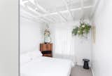 On the first floor, the ceiling structure is exposed to increase the volume of space, and rooflights and mirrors elongate views, actually and virtually respectively