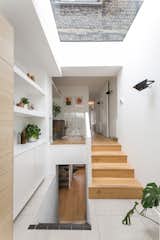 The ground floor feels more spacious due to the incorporation of split levels, and views through to the living space, and down to the lower-ground floor.