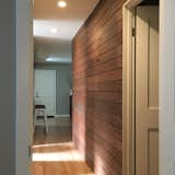 Douglas fir veneered plywood with hidden hall closet.
